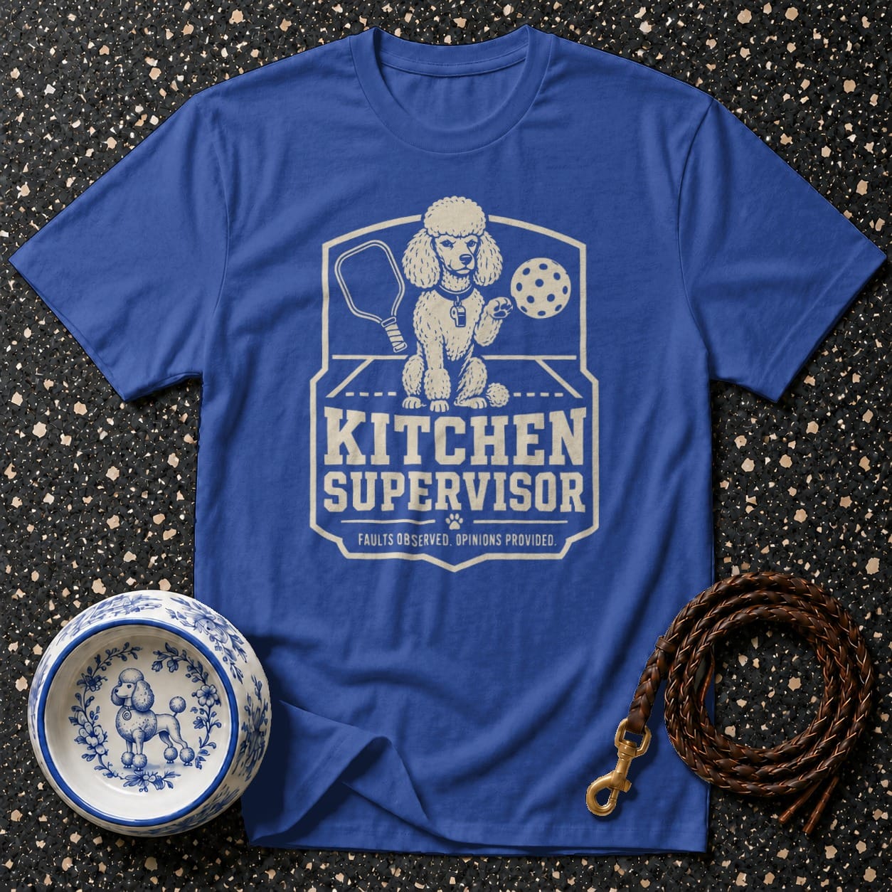 Blue t-shirt with "KITCHEN SUPERVISOR" text and a poodle graphic.