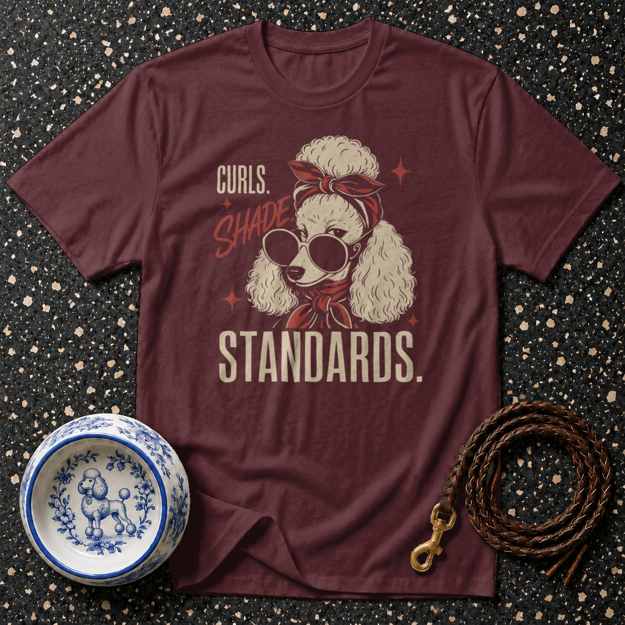 Maroon t-shirt with poodle graphic, "Curls. Shade. Standards." text.