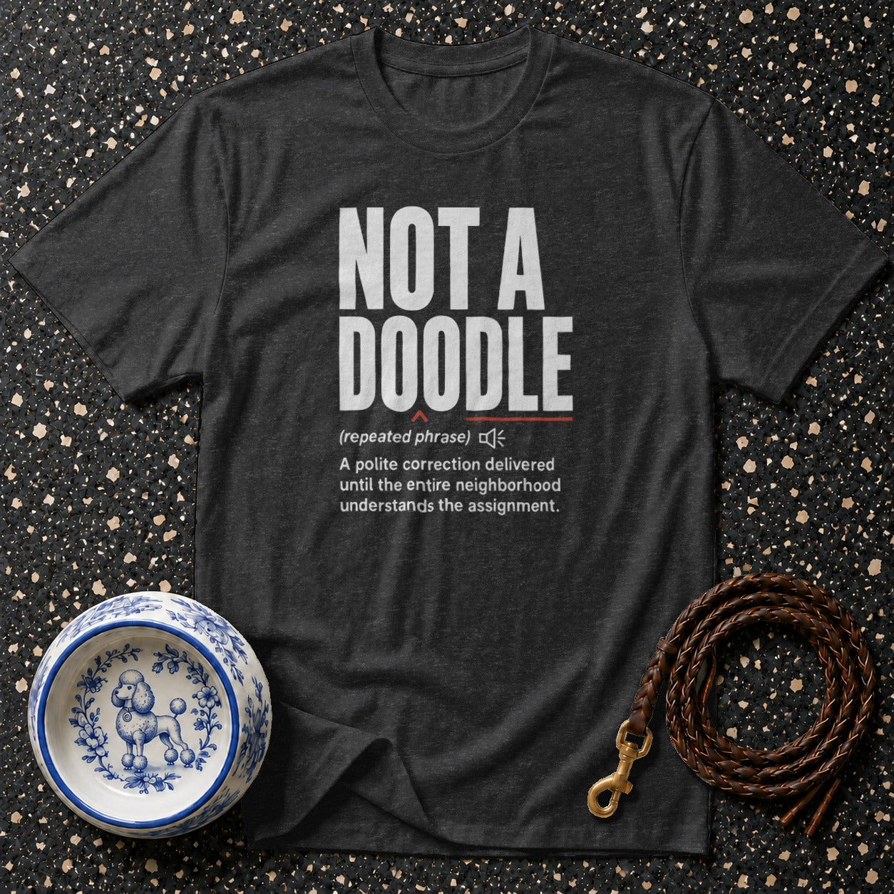 Dark gray t-shirt with "NOT A DOODLE" definition below.