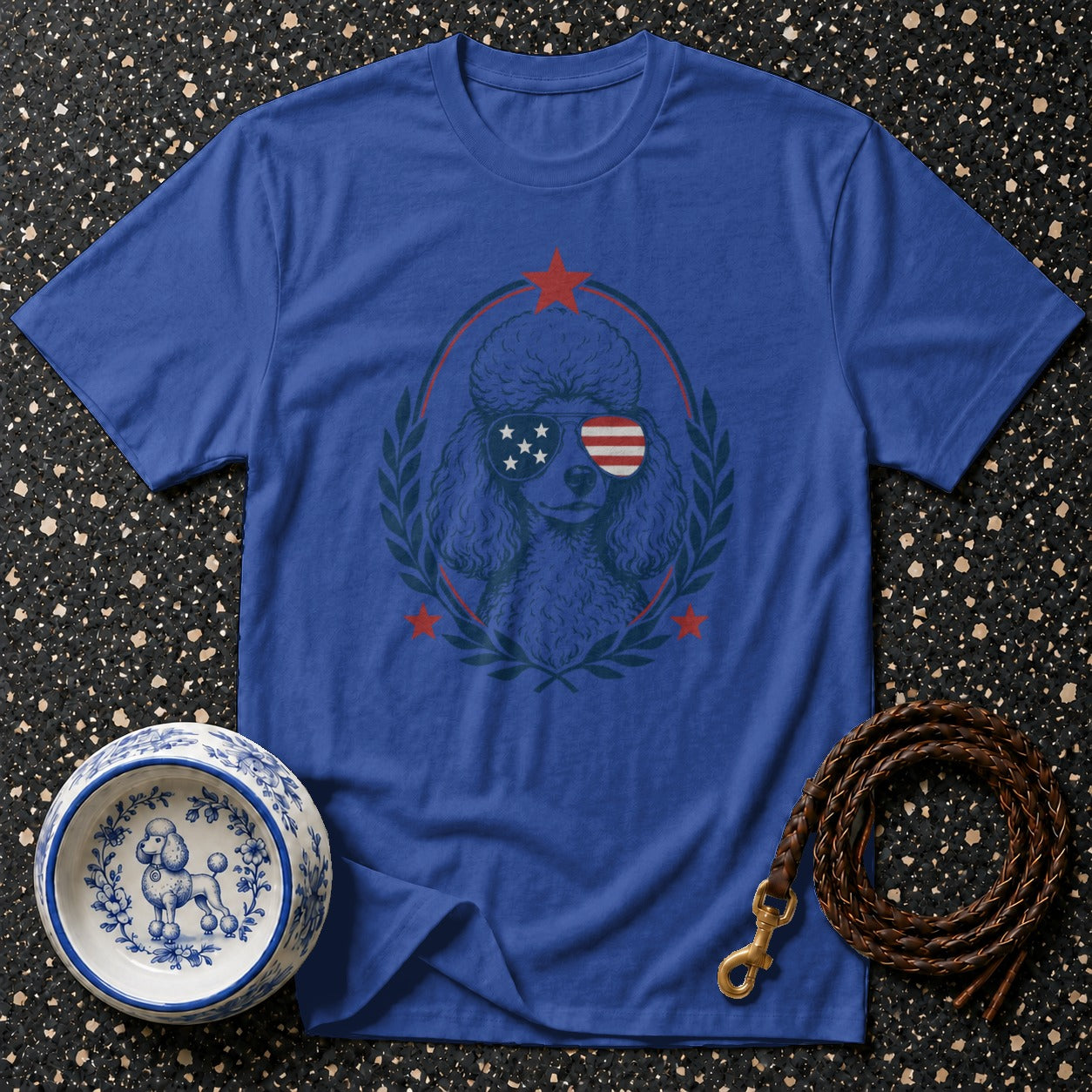 Blue t-shirt with patriotic poodle graphic wearing American flag sunglasses.