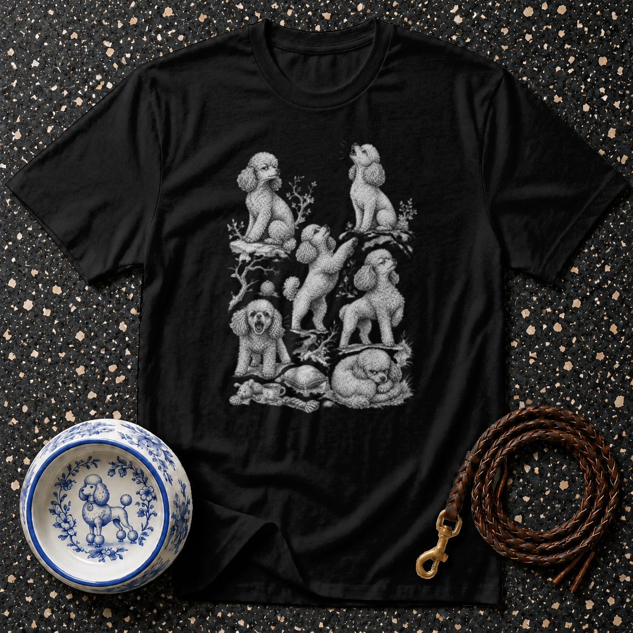 Black t-shirt with a detailed sketch of poodles in various poses.