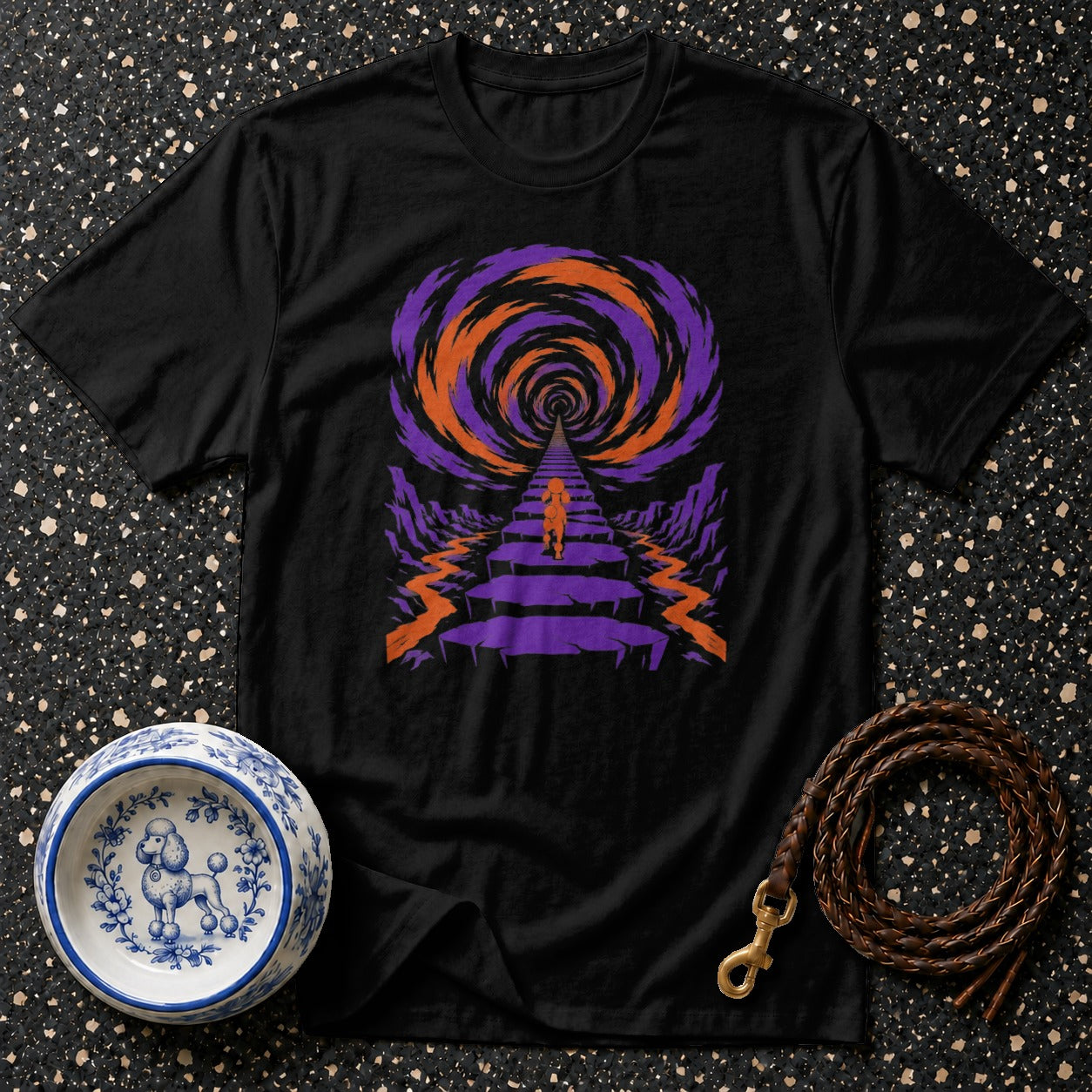 Black t-shirt with a purple and orange psychedelic tunnel graphic and a dog.