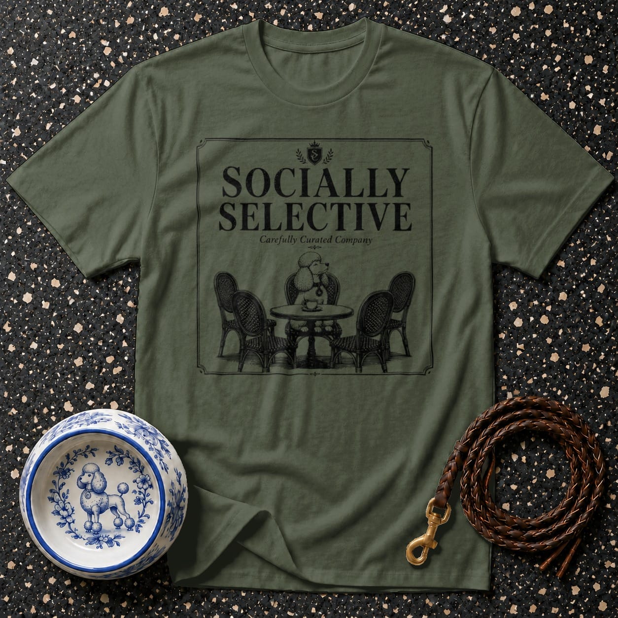 Olive green t-shirt with "SOCIALLY SELECTIVE" and poodle illustration.