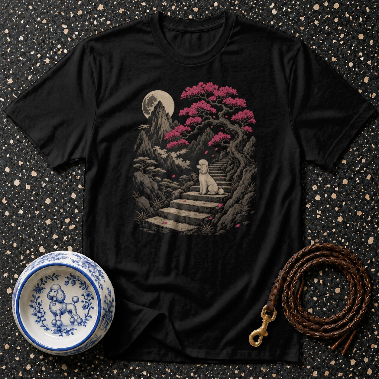 Black t-shirt with white poodle on stairs, moon, and cherry blossom tree.
