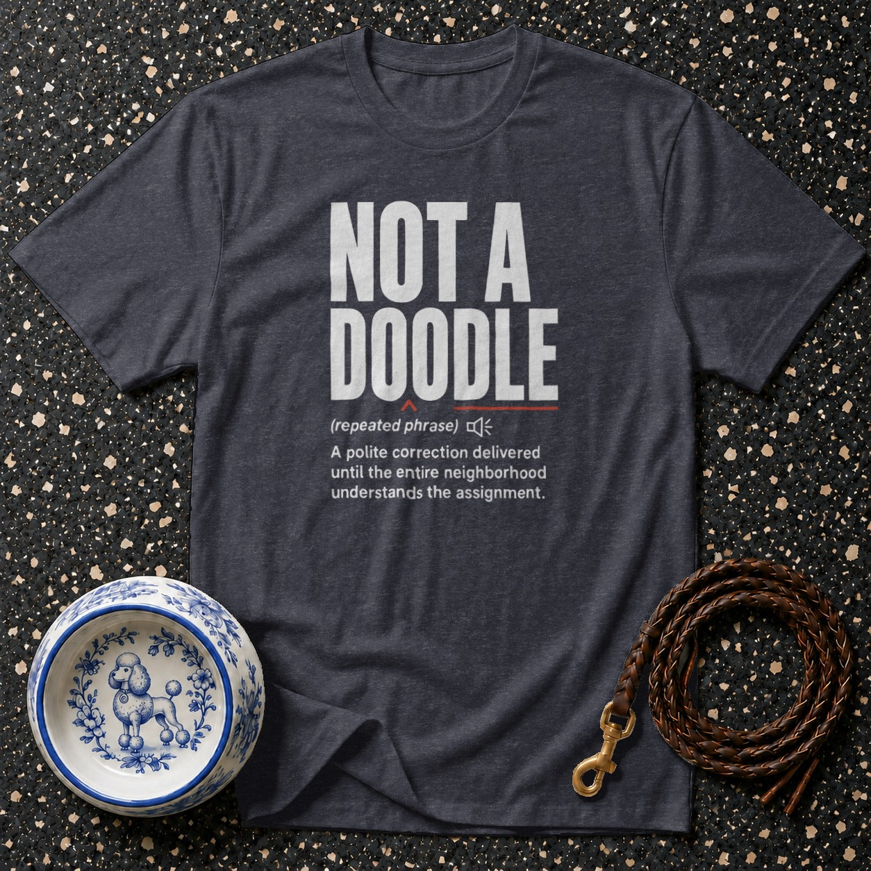 Dark grey t-shirt with "NOT A DOODLE" and definition text.