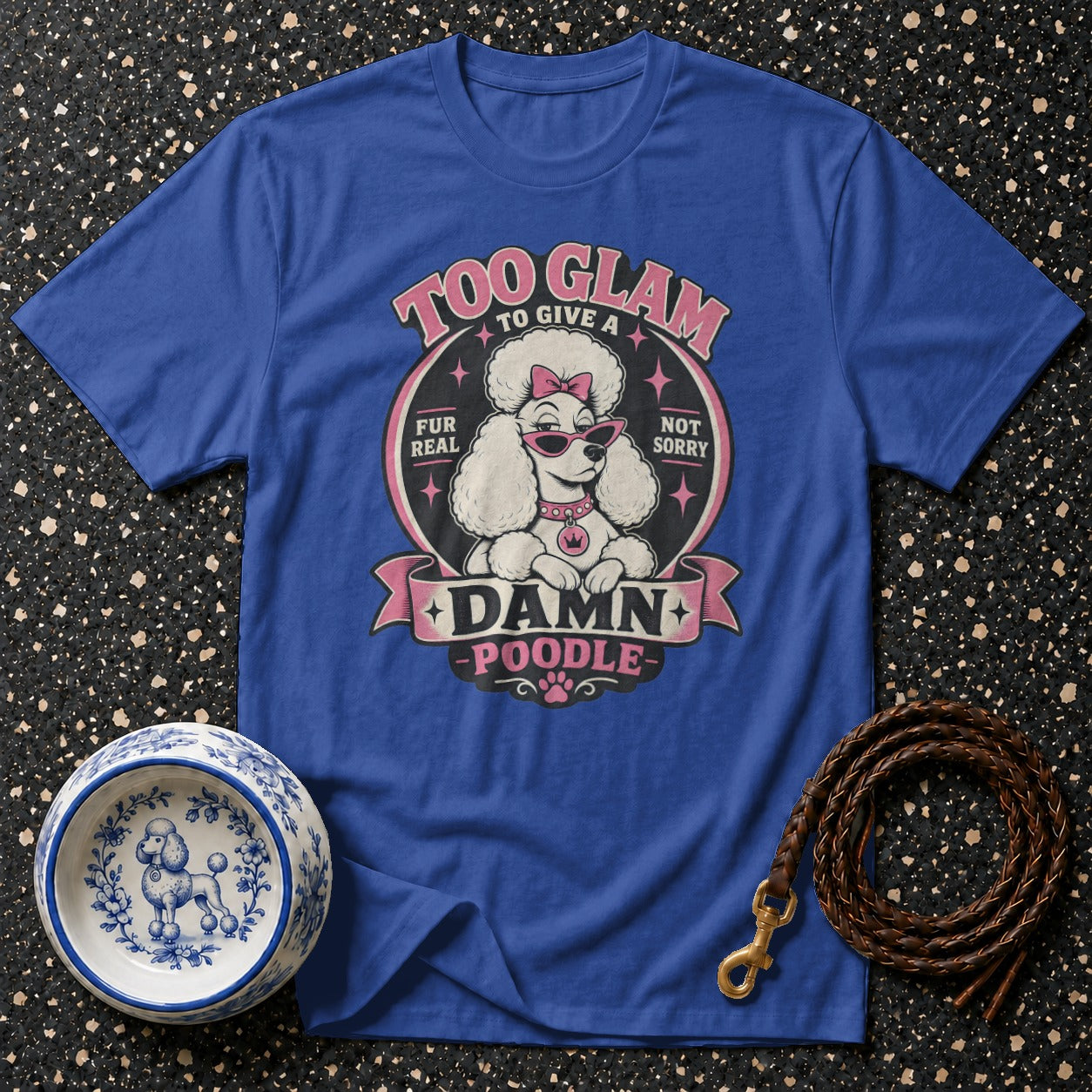 Blue t-shirt with a poodle graphic and text "Too Glam to Give a Damn Poodle".