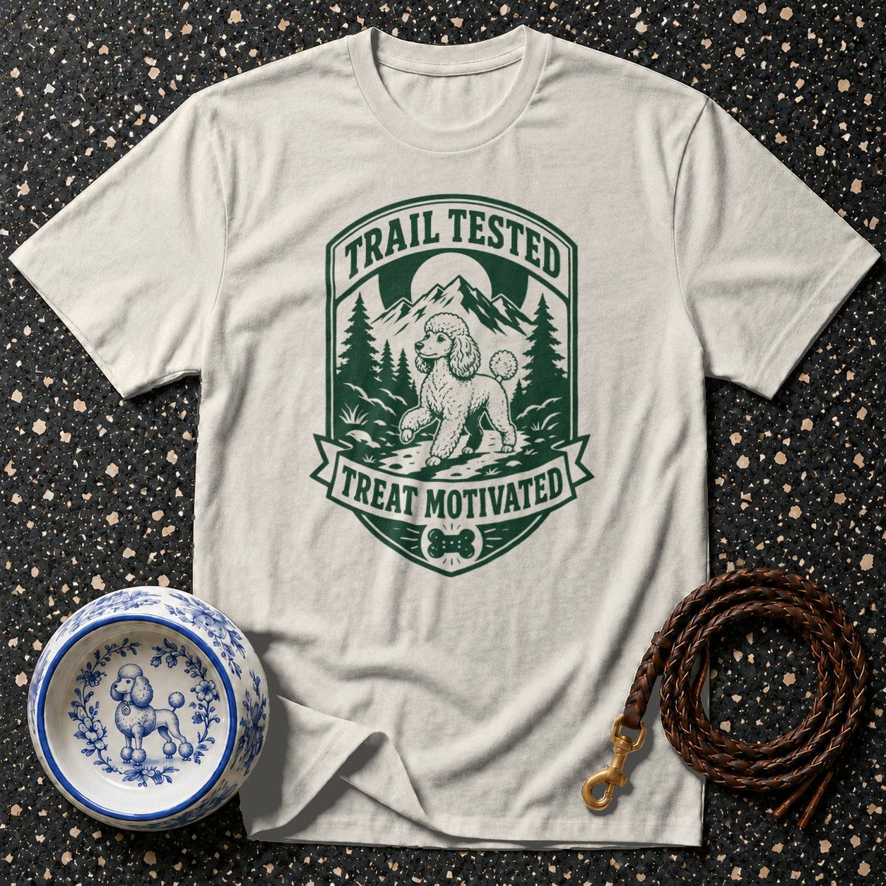 Light grey t-shirt with "Trail Tested Treat Motivated" graphic of a poodle hiking.