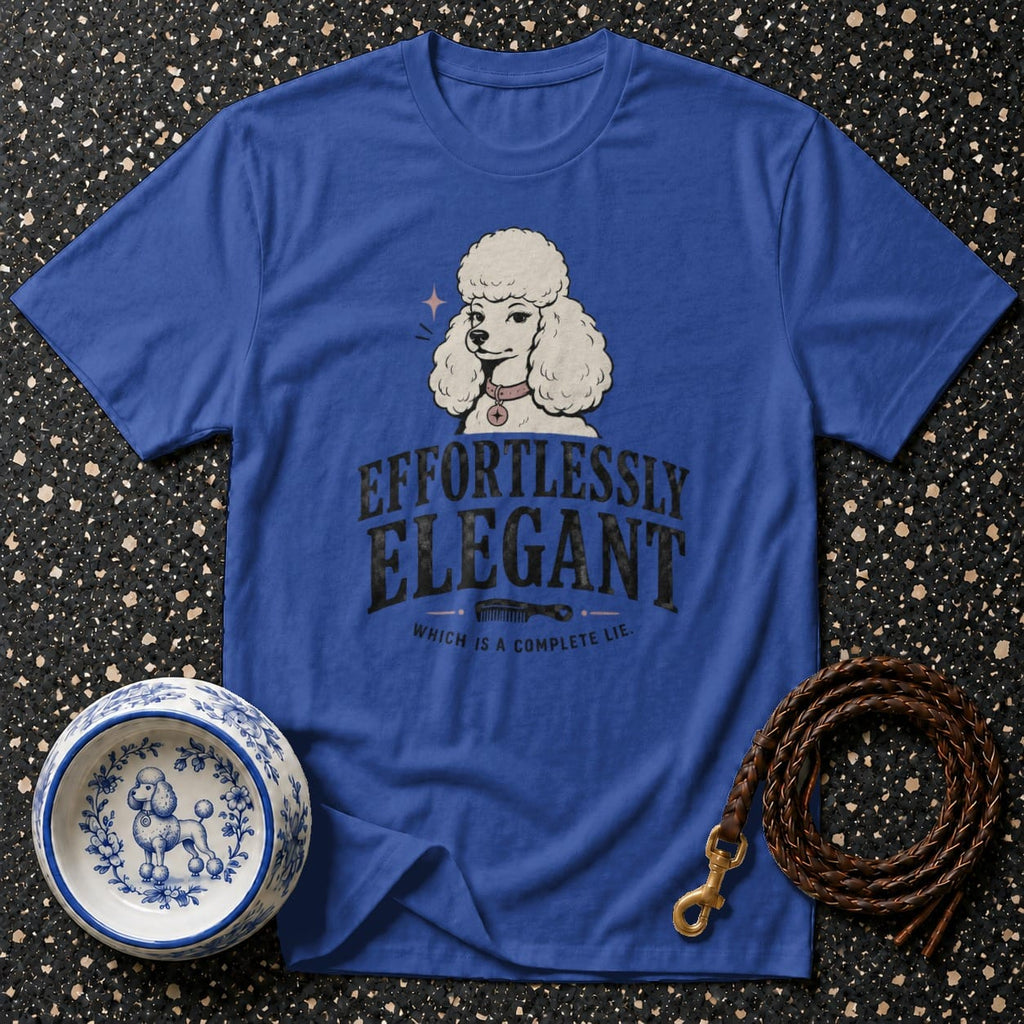 Blue t-shirt with a poodle graphic and the text "EFFORTLESSLY ELEGANT, WHICH IS A COMPLETE LIE."