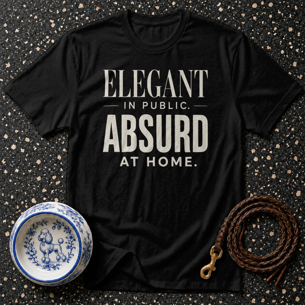 Black t-shirt with "ELEGANT IN PUBLIC. ABSURD AT HOME." text.