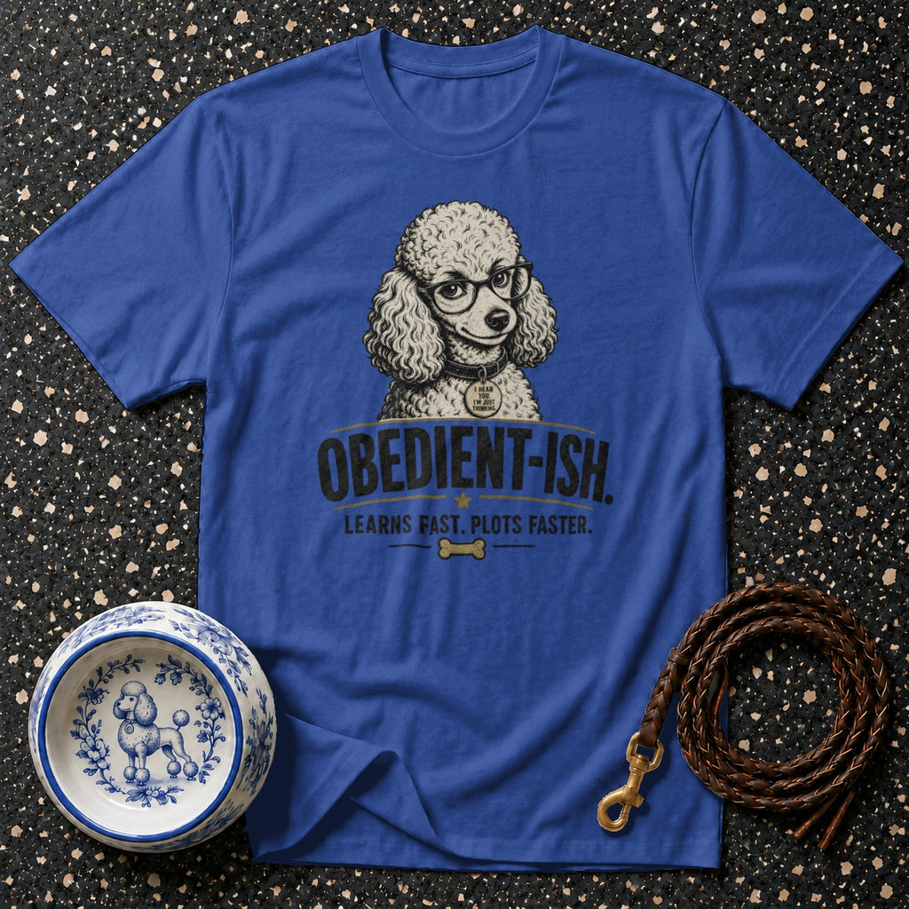 Blue t-shirt with a poodle wearing glasses titled "Obedient-ish. Learns fast. Plots faster."