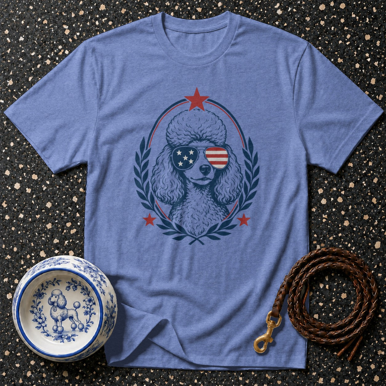 Blue t-shirt with a poodle wearing American flag sunglasses in a laurel wreath.