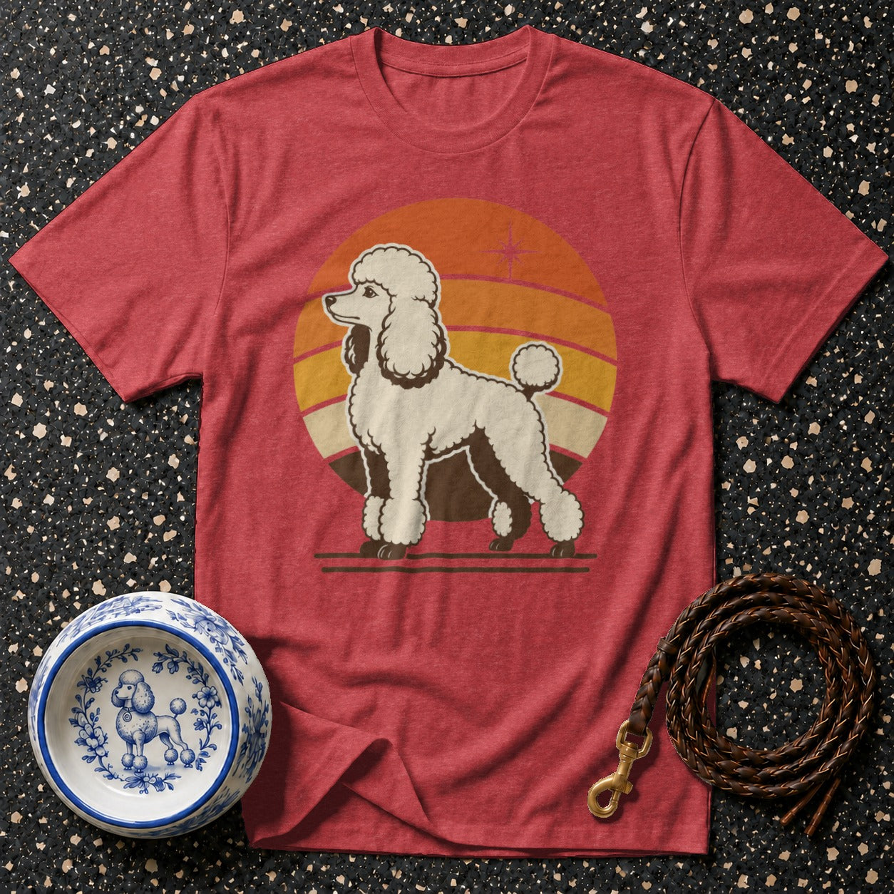 Red t-shirt with white poodle graphic and retro sunset.