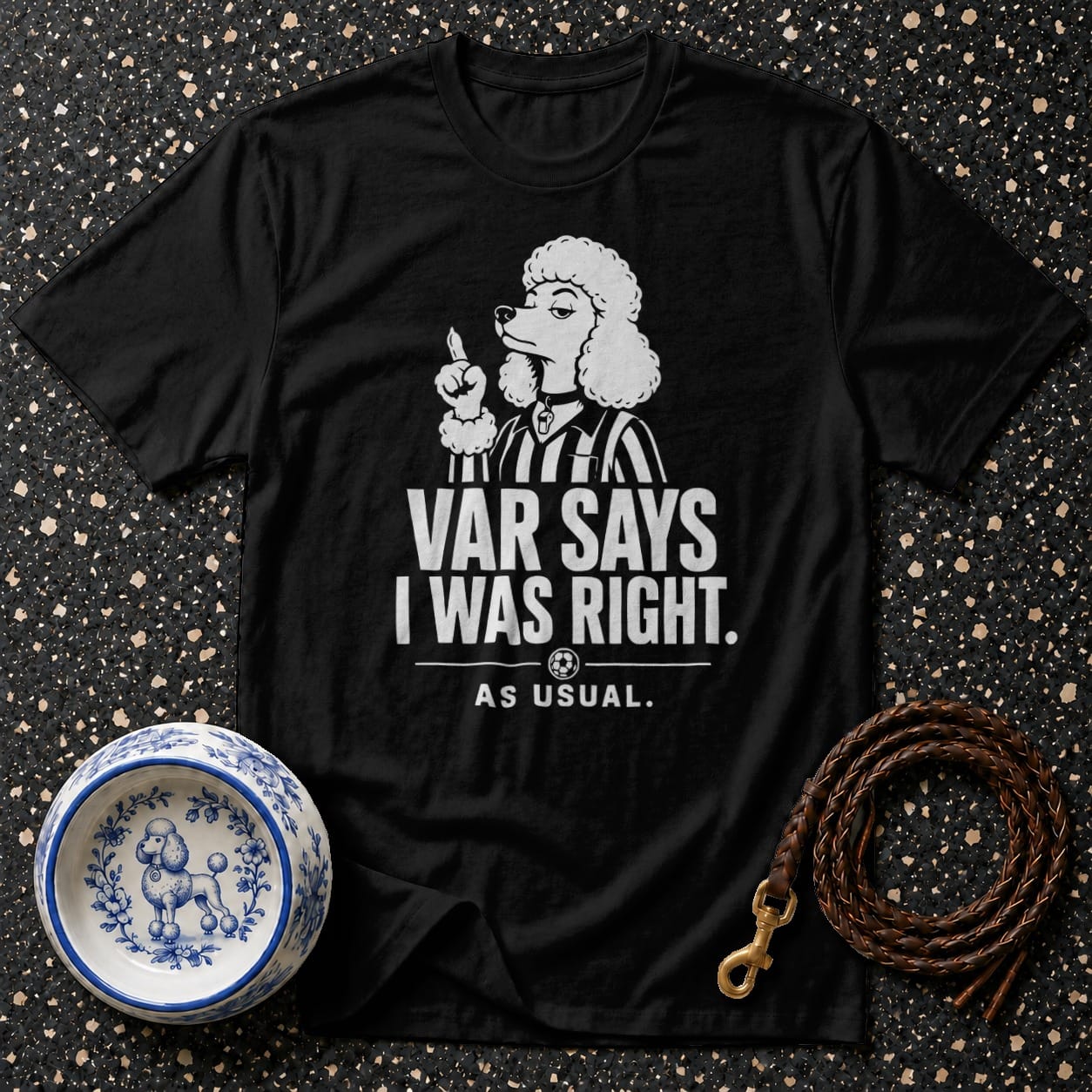 Black t-shirt with a white graphic of a poodle referee saying "VAR SAYS I WAS RIGHT. AS USUAL."