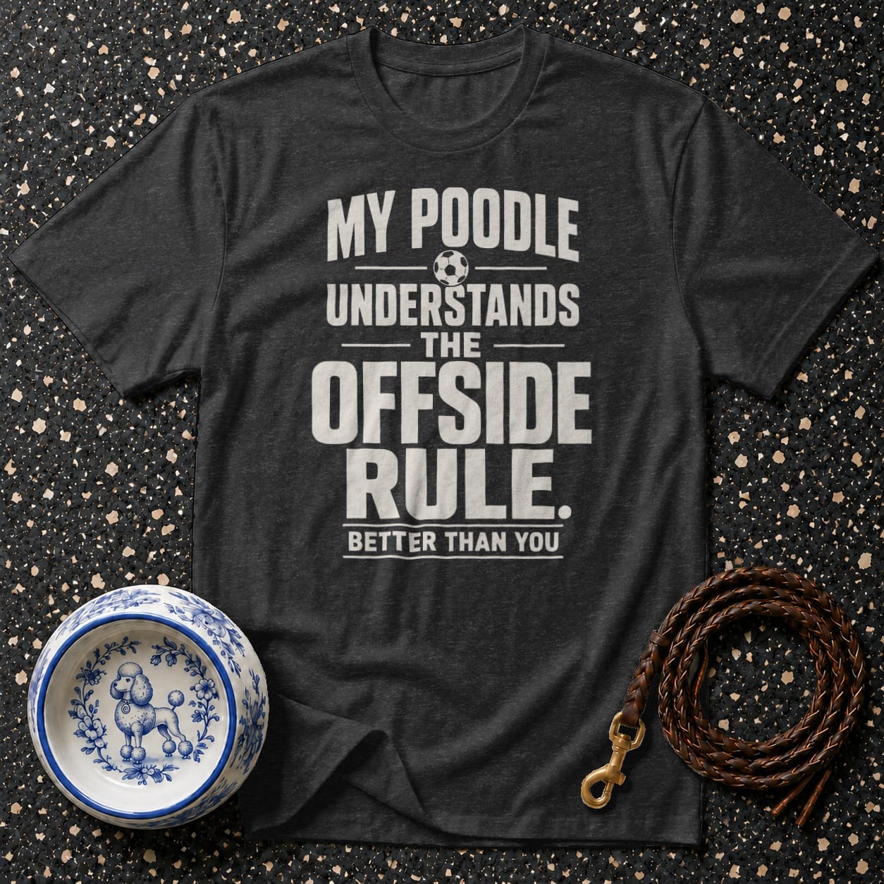 Dark gray t-shirt with "My poodle understands the offside rule better than you" text and soccer ball.