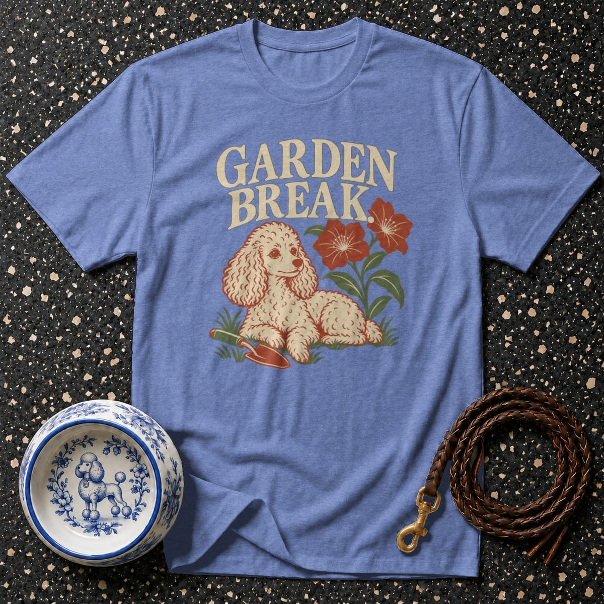 Blue t-shirt with "GARDEN BREAK" text, a poodle, and flowers design.