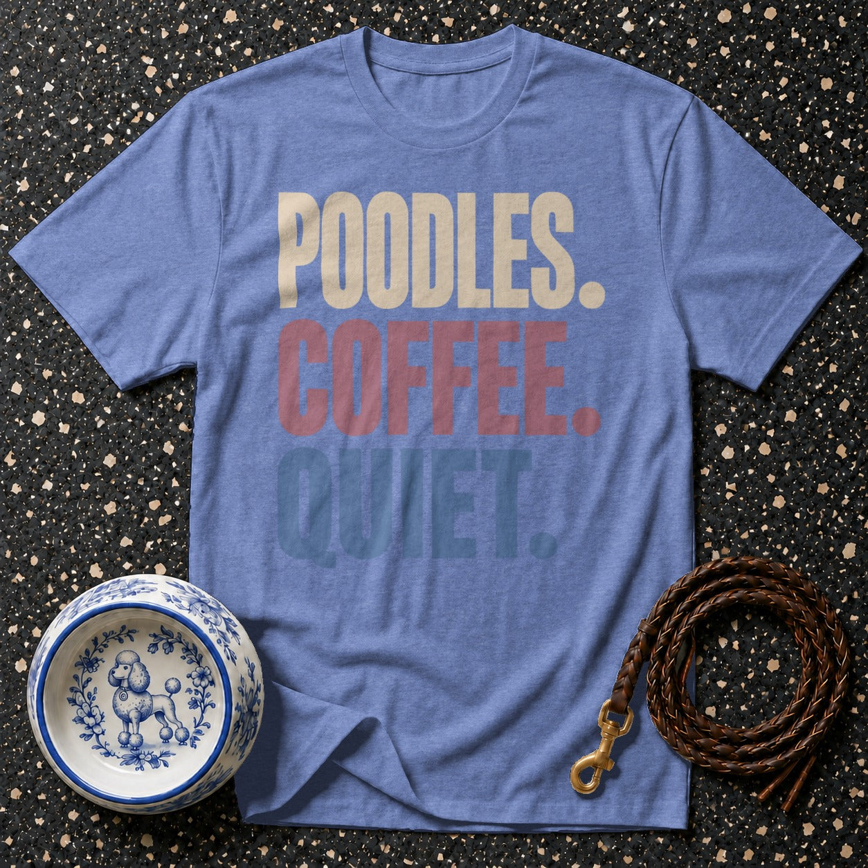 Blue t-shirt with "POODLES. COFFEE. QUIET." text, dog bowl, and leash.