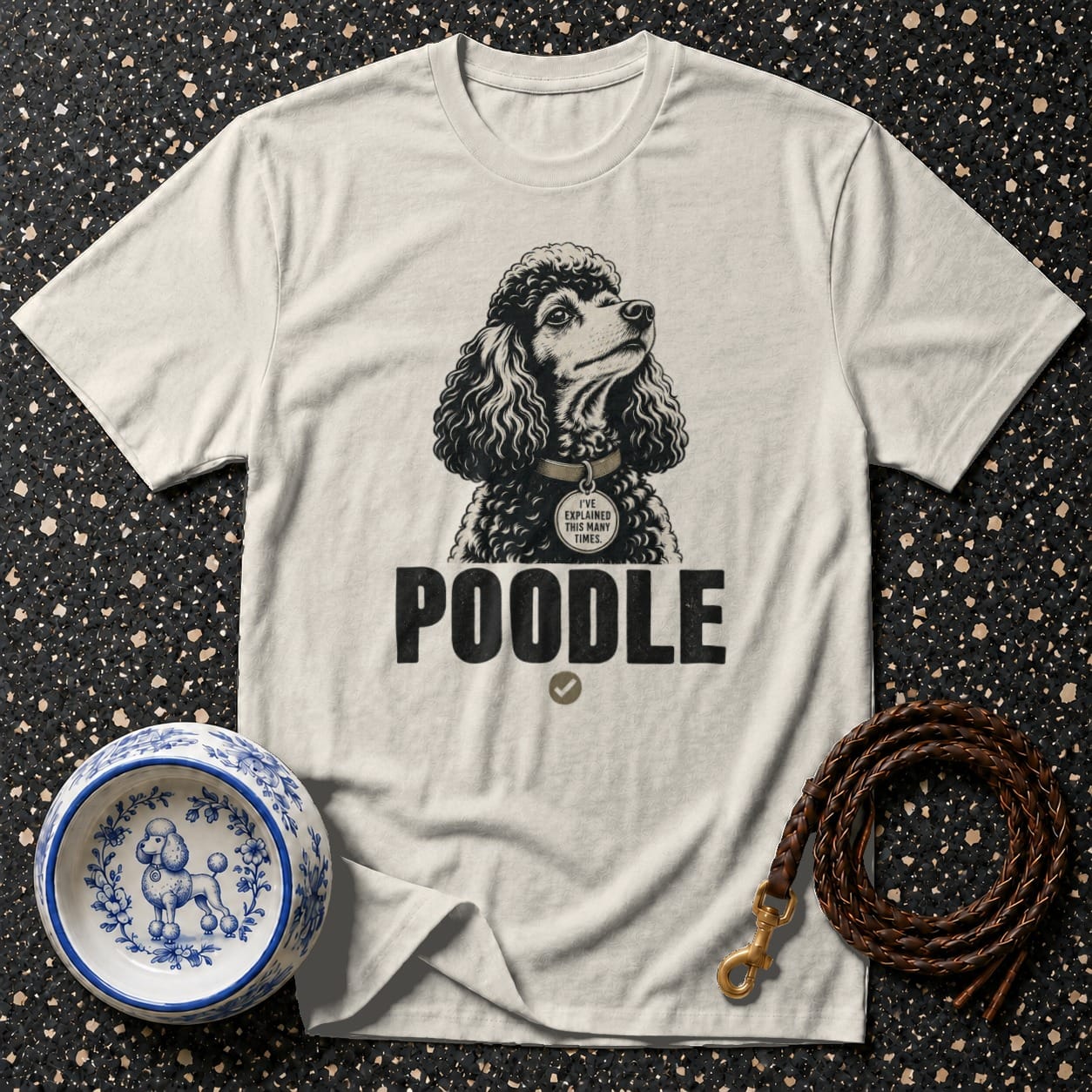 T-shirt with black poodle graphic and "POODLE" text. Dog bowl and leash present.