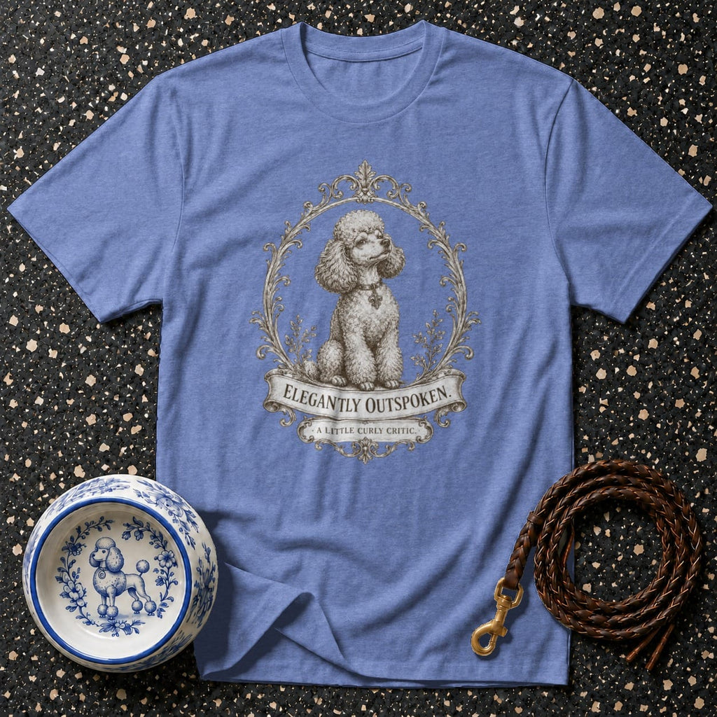 Blue t-shirt with poodle illustration and text "ELEGANTLY OUTSPOKEN".