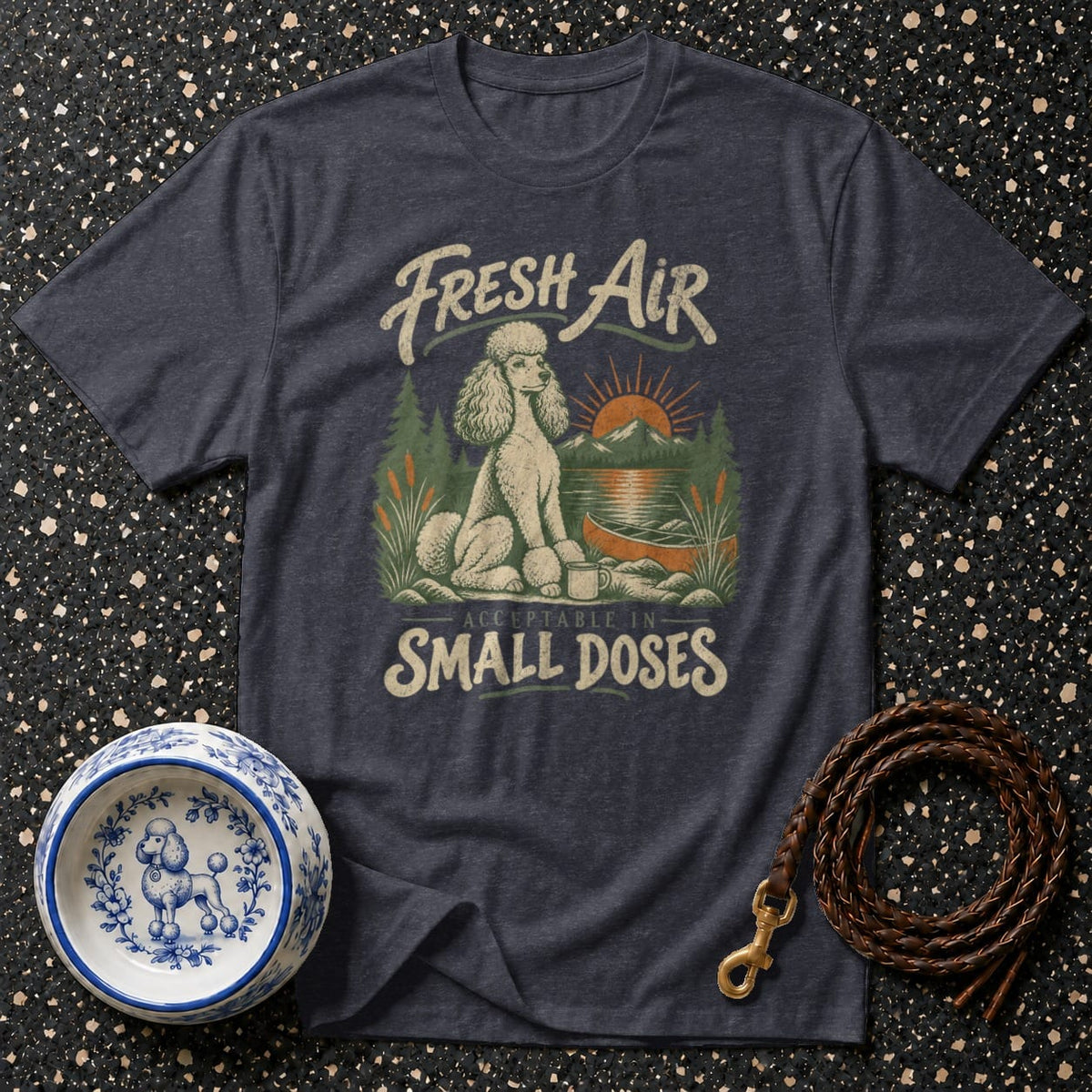 Dark gray t-shirt with a graphic of a poodle by a lake, text reads "Fresh Air Acceptable in Small Doses."