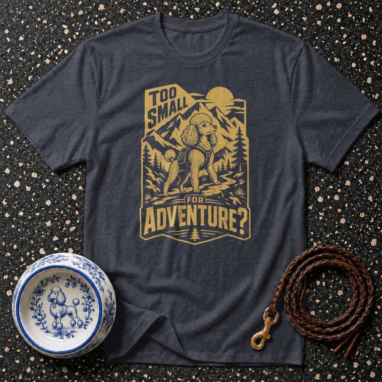 T-shirt graphic with poodle hiking in mountains, text "Too small for adventure?".