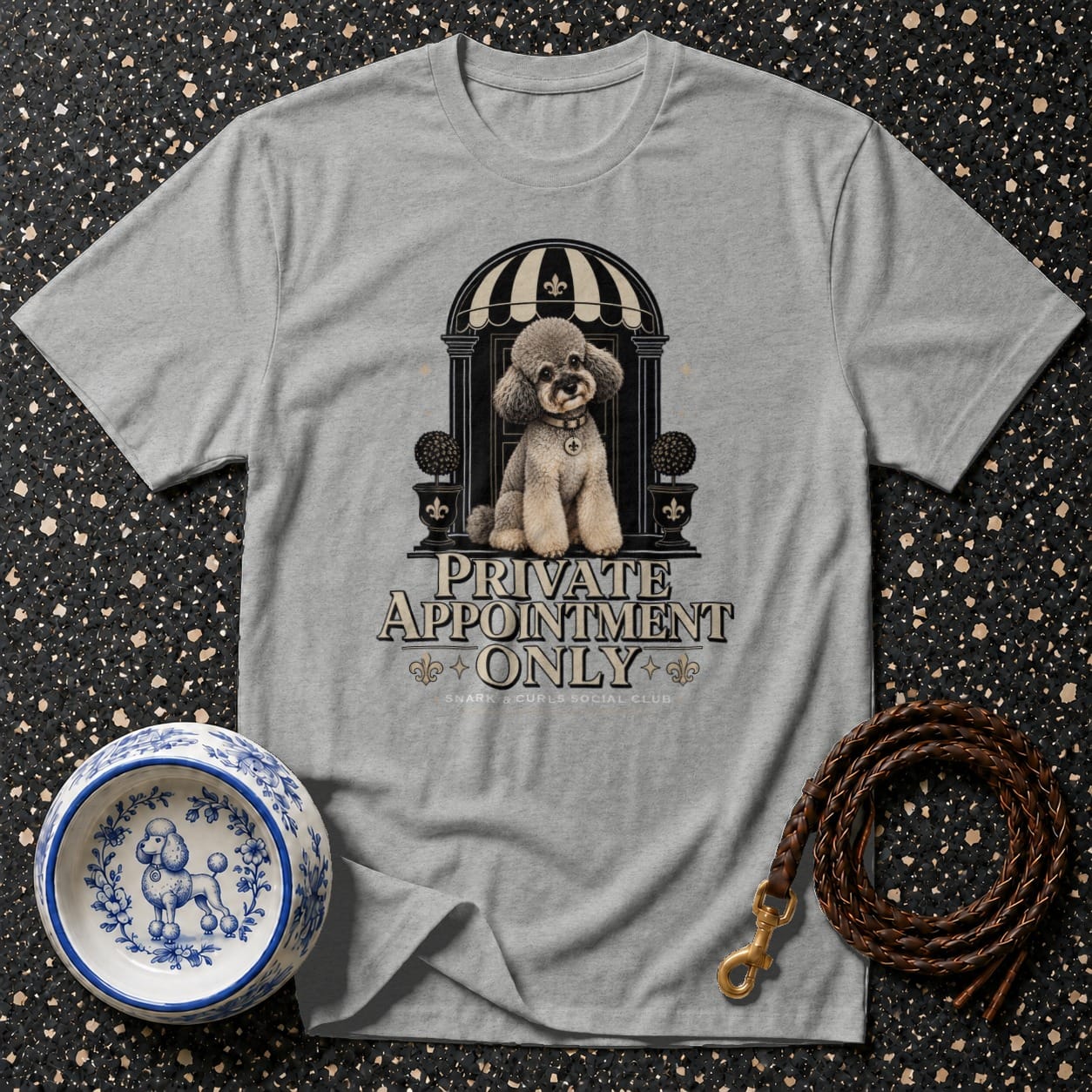 Grey t-shirt with a graphic of a poodle and text "PRIVATE APPOINTMENT ONLY".
