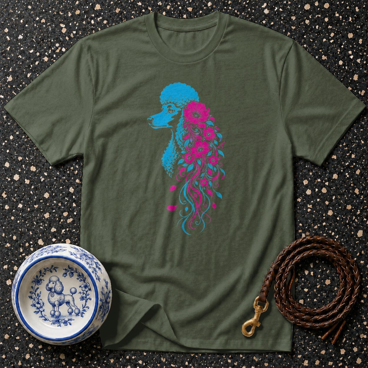Green t-shirt with blue and pink poodle floral design.