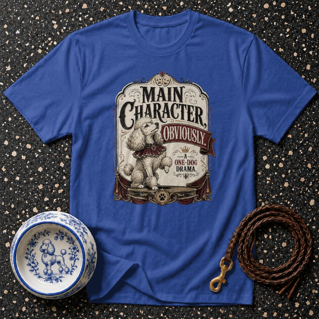 Royal blue t-shirt with poodle graphic reading "Main Character Obviously: A One-Dog Drama".