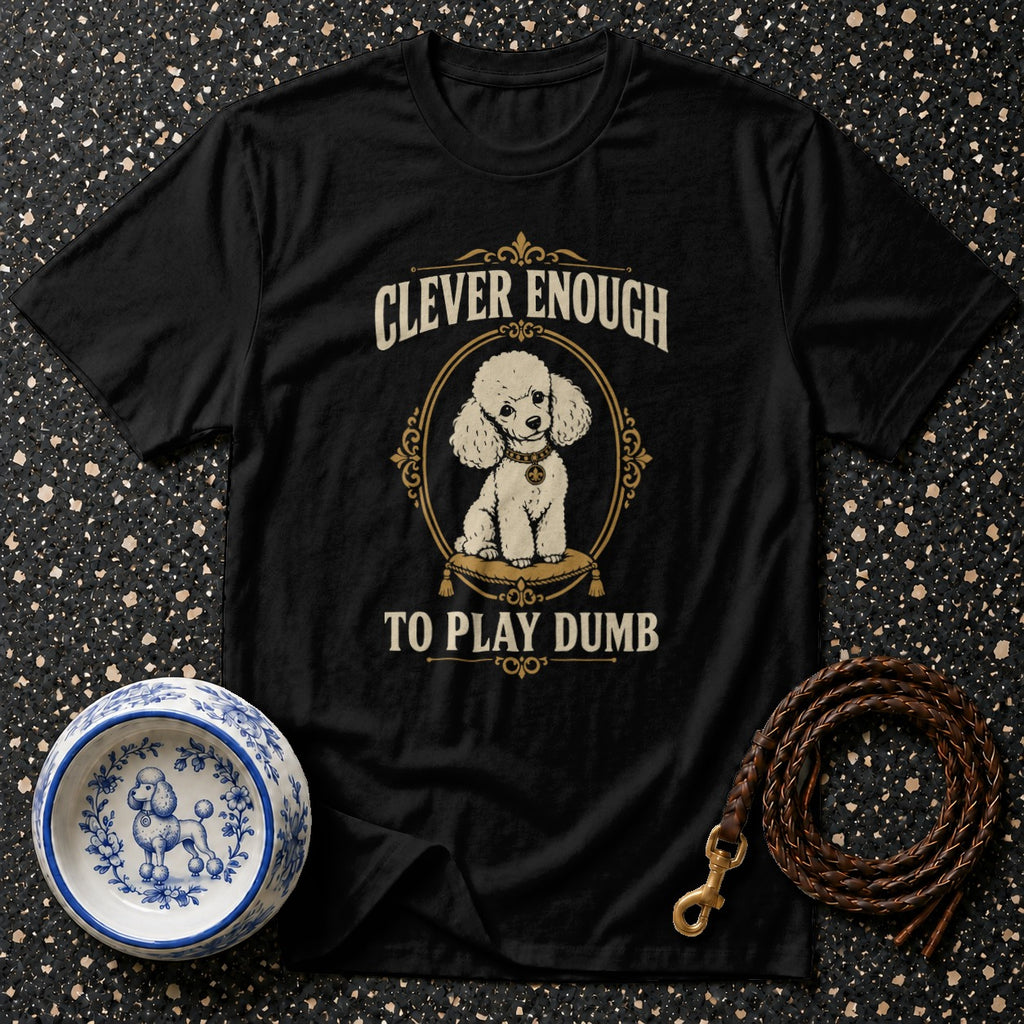 Black t-shirt with a white poodle illustration and text: "Clever Enough To Play Dumb".