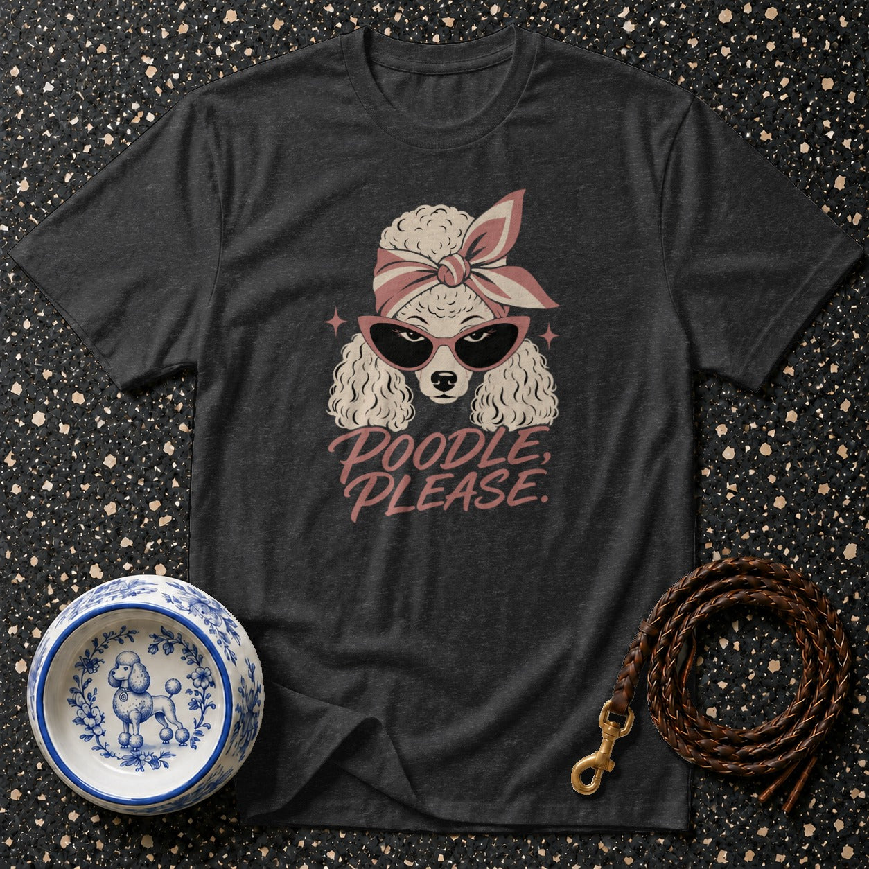 Dark t-shirt with a cartoon poodle wearing sunglasses and a bandana, text "Poodle, Please."