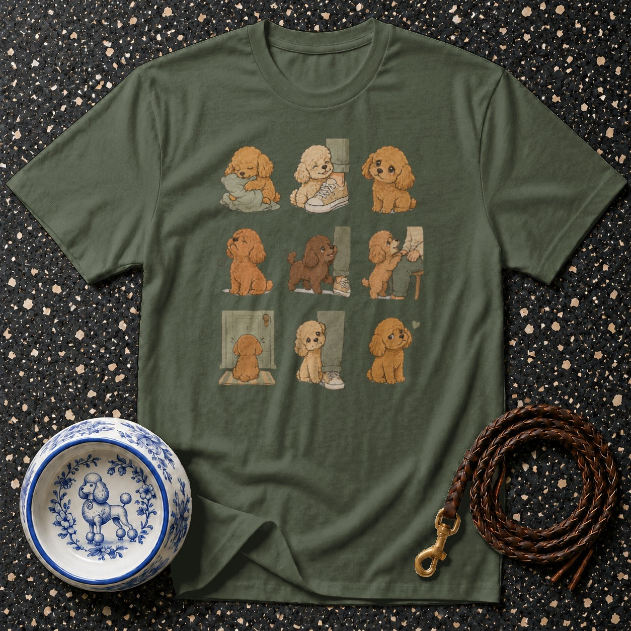 Green t-shirt with a repeating pattern of whimsical poodle illustrations in nine panels.