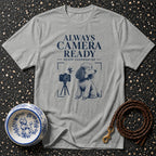 Grey t-shirt with "Always Camera Ready Never Cooperative" text and poodle graphic.