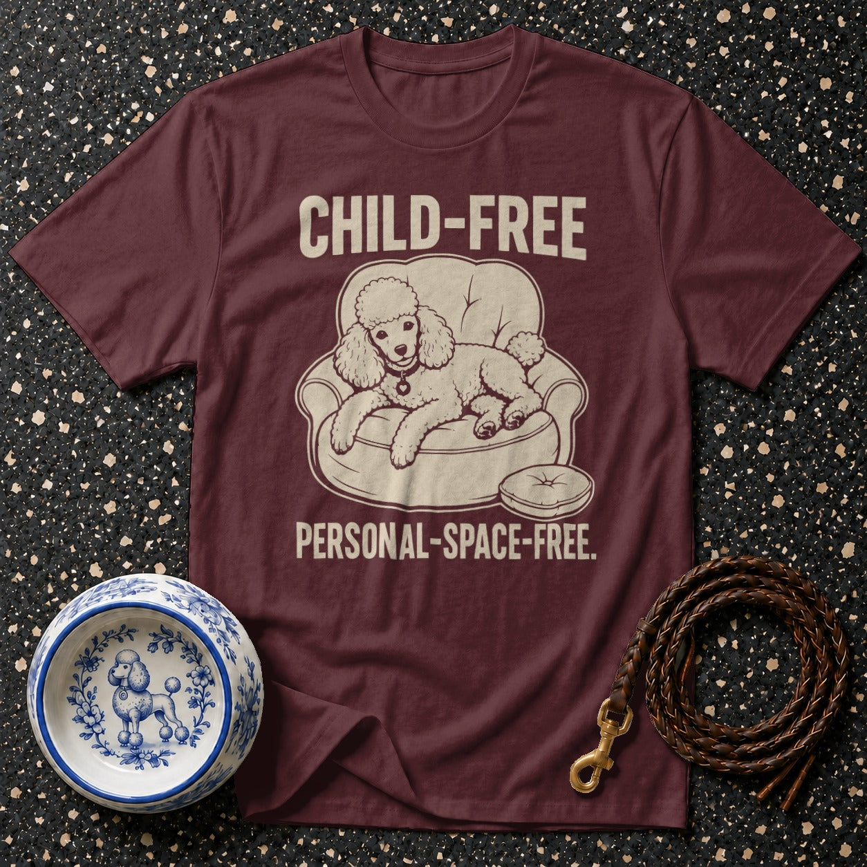 Maroon t-shirt with "CHILD-FREE PERSONAL SPACE-FREE" text and poodle graphic.