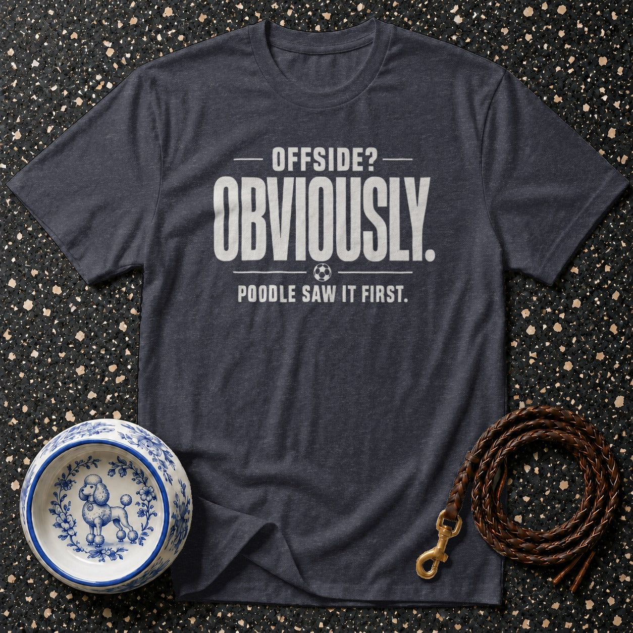 Dark grey t-shirt with "Offside? Obviously. Poodle saw it first." graphic.