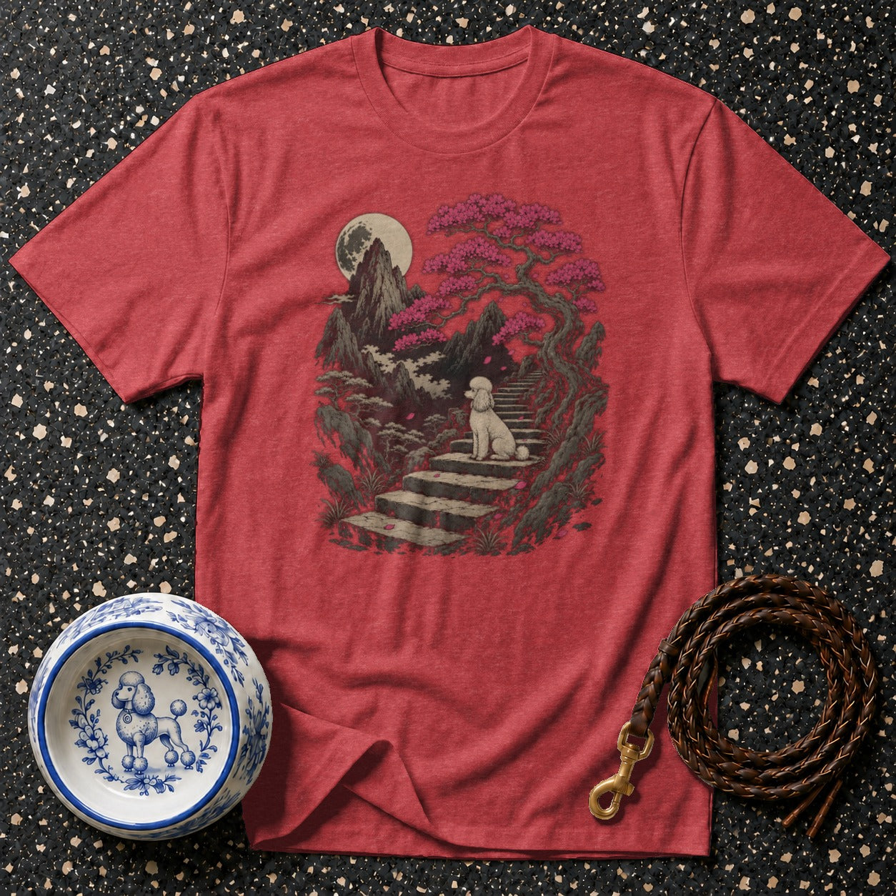 Red t-shirt featuring a white poodle on stairs in a serene landscape.