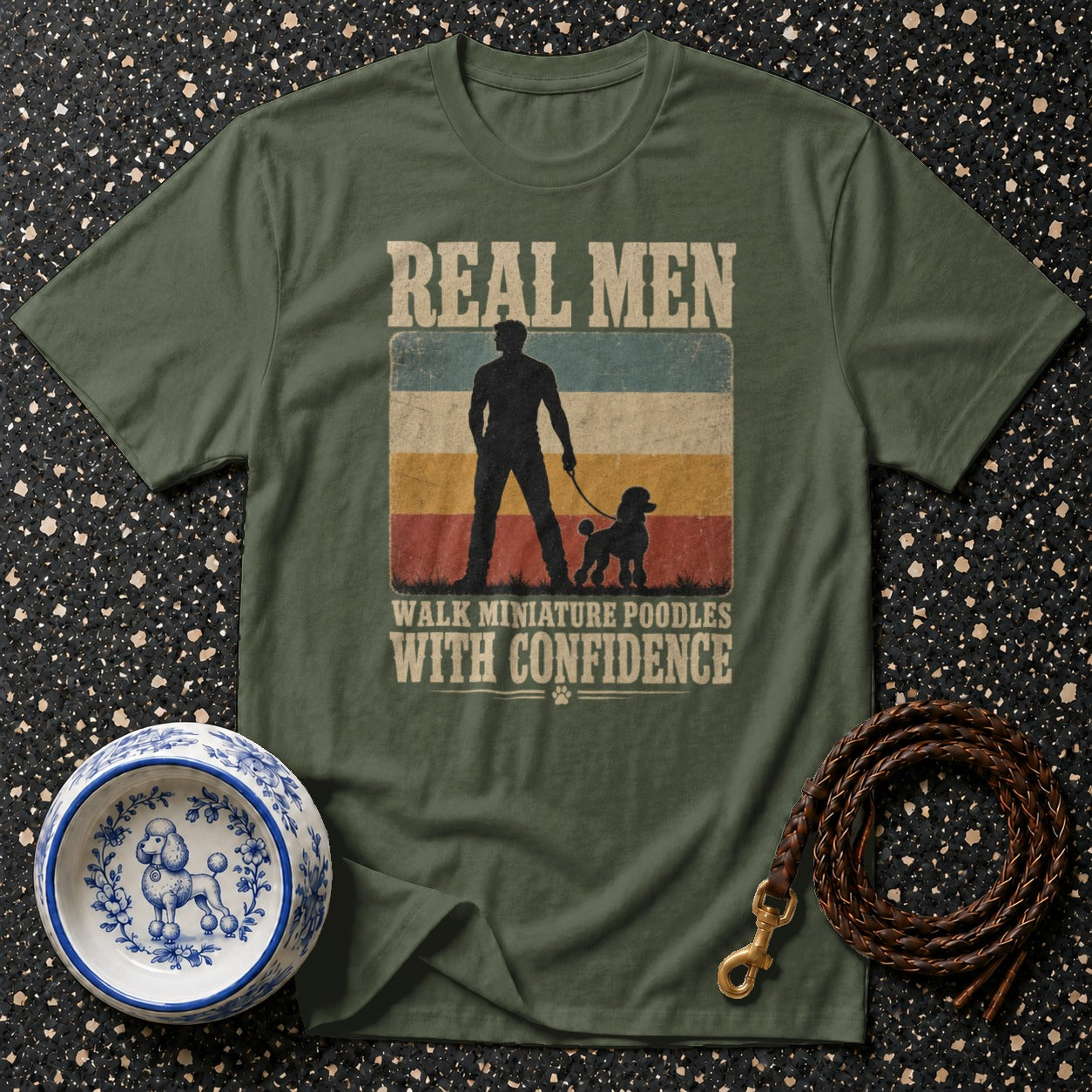 T-shirt with "Real Men Walk Miniature Poodles With Confidence" graphic.