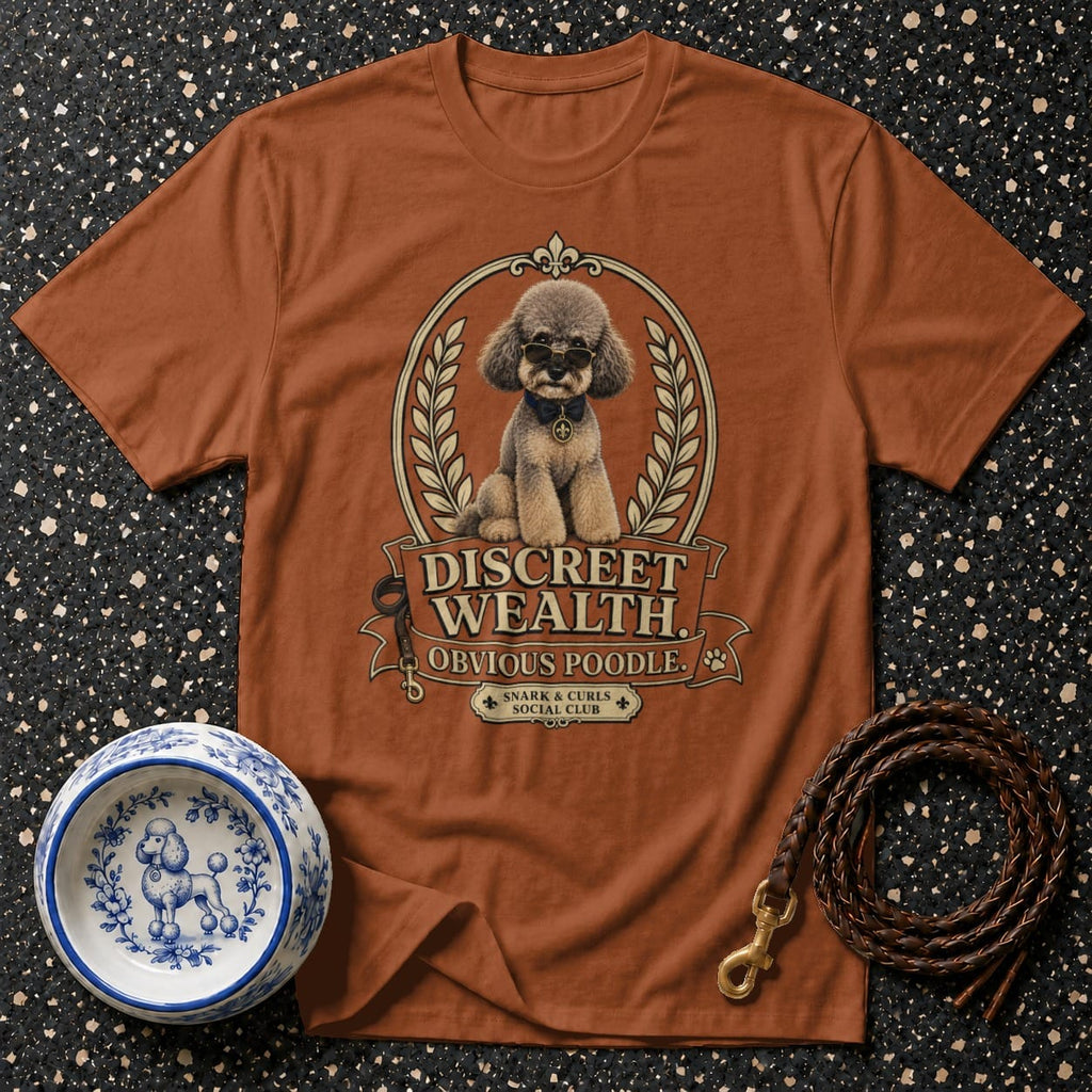 Brown t-shirt with a poodle wearing sunglasses and text "Discreet Wealth".