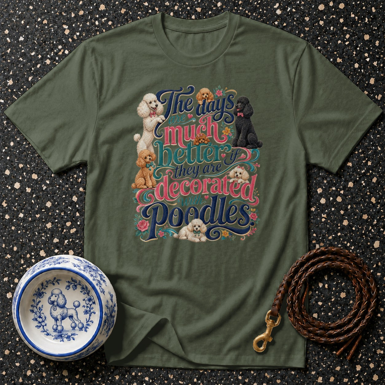 Green t-shirt with "The days are much better if they are decorated with Poodles" text and poodles.