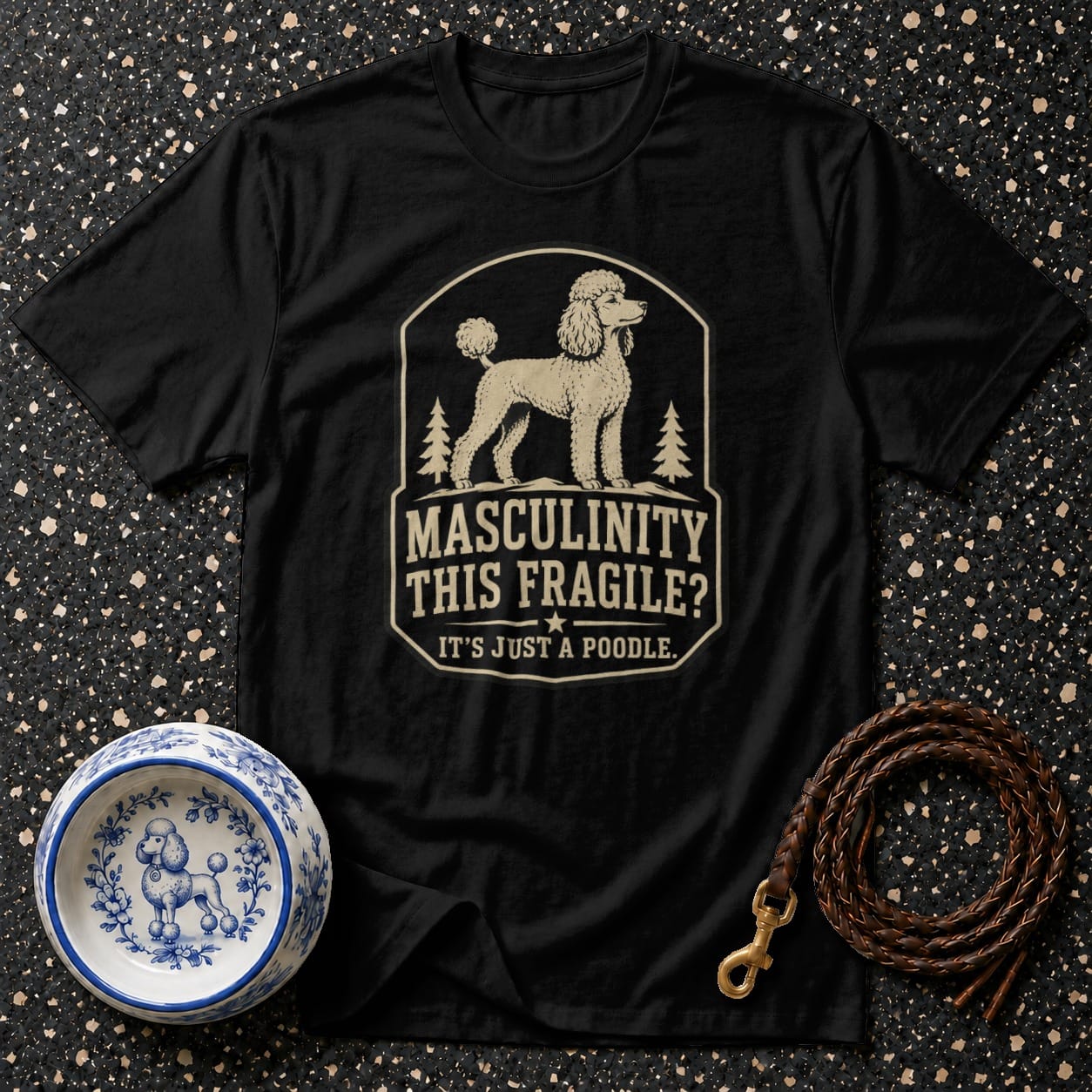 Black t-shirt with a poodle graphic and text "Masculinity This Fragile? It's Just a Poodle."