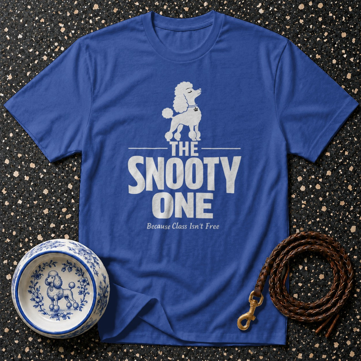 Blue t-shirt with white poodle graphic and text "The Snooty One"