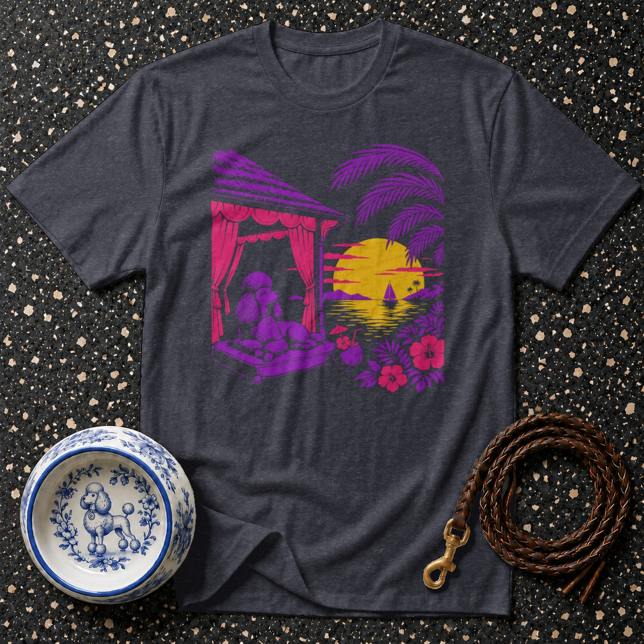 Dark grey t-shirt with a tropical poodle graphic, featuring a sunset over the ocean.
