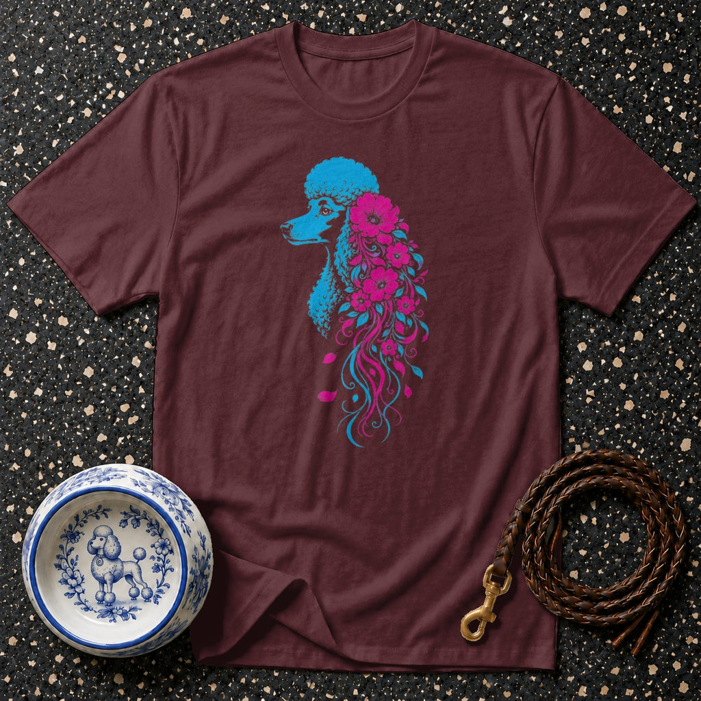 Maroon t-shirt with blue and pink poodle graphic, floral details, pet bowl, and leather leash.