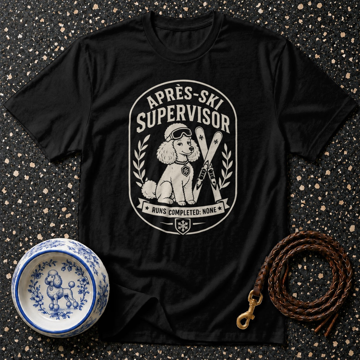 Black t-shirt with novelty graphic of a poodle wearing ski goggles and text.