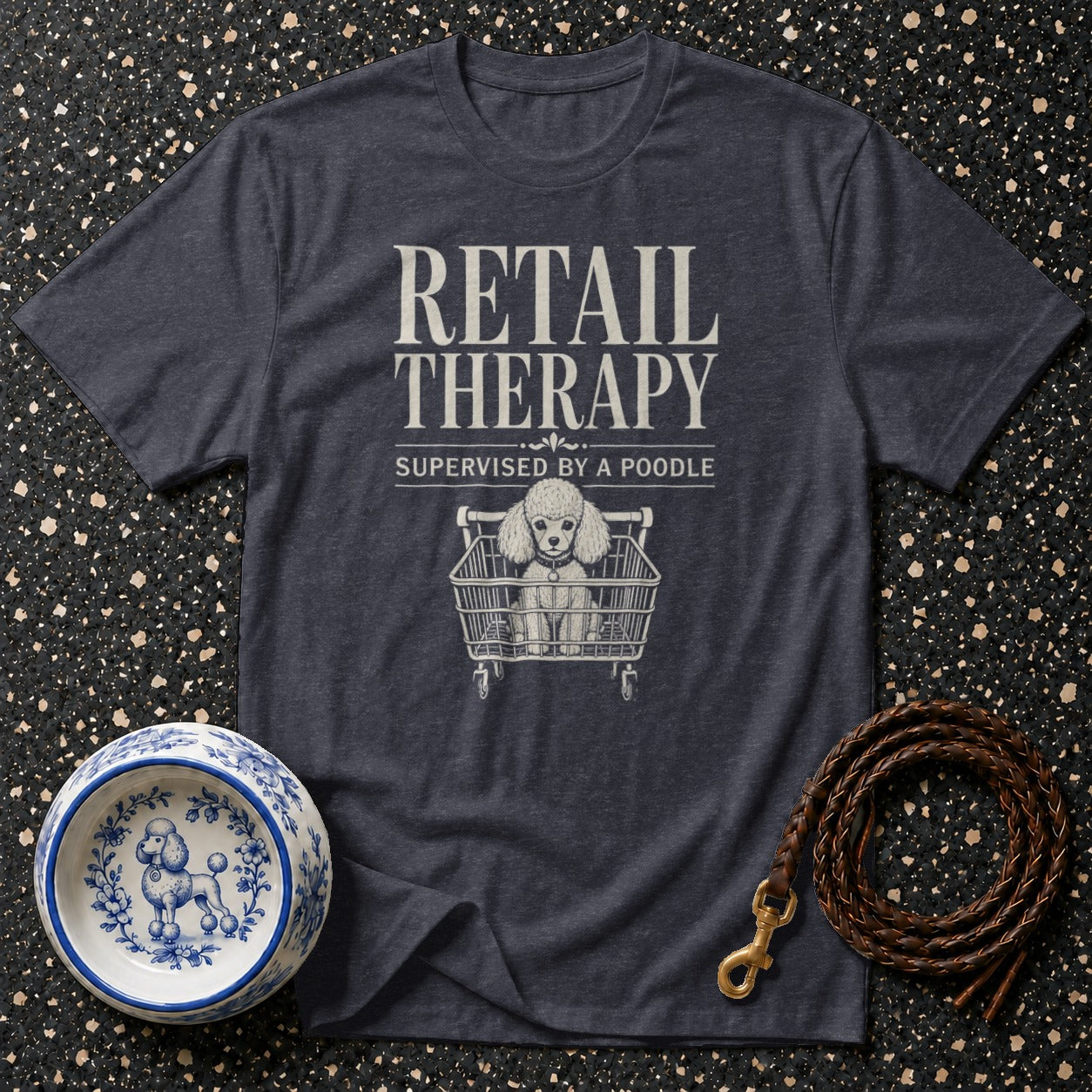 T-shirt with "Retail Therapy Supervised by a Poodle" and poodle in shopping cart graphic.