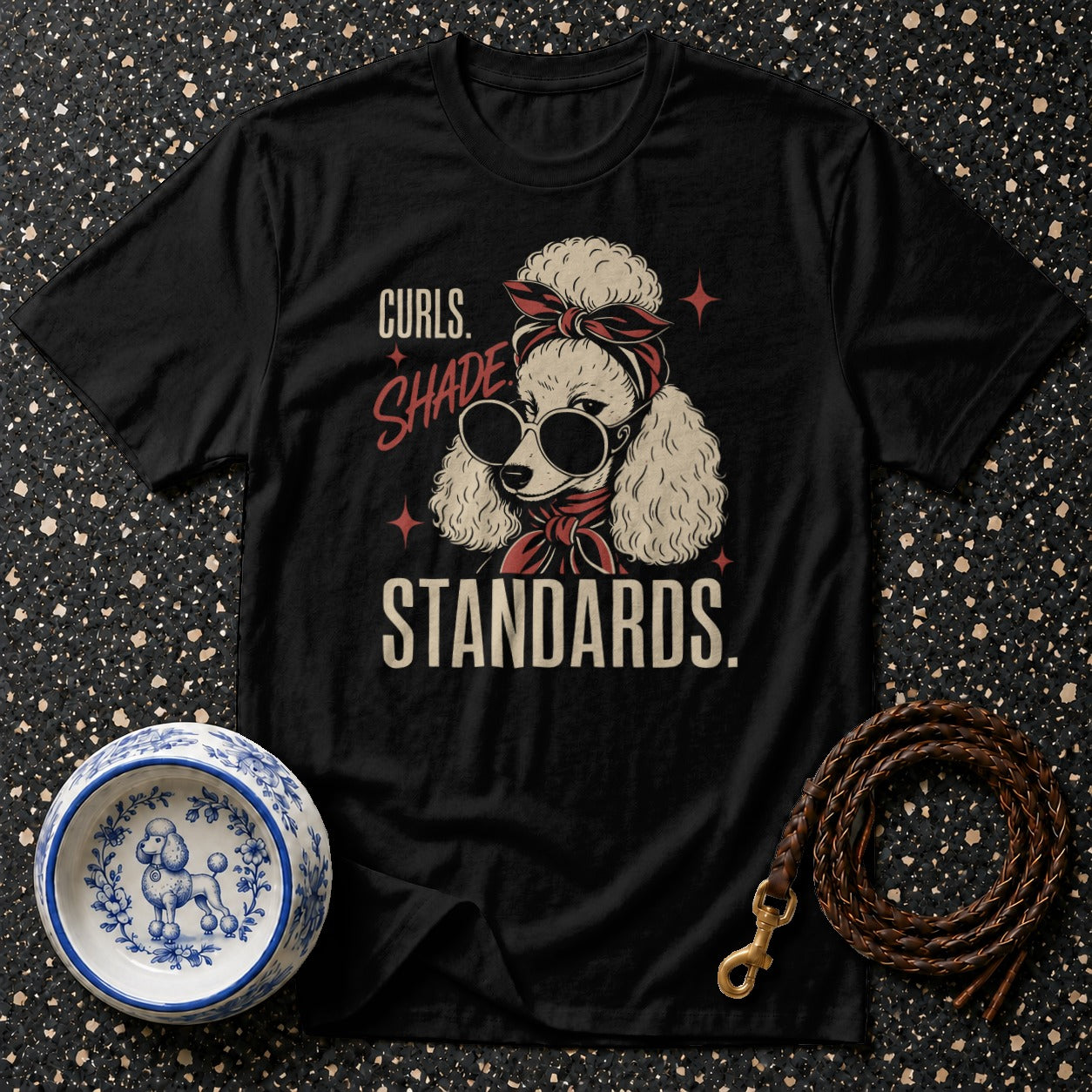 Black t-shirt with a graphic of a poodle wearing sunglasses and a bandana, reading "Curls. Shade. Standards."