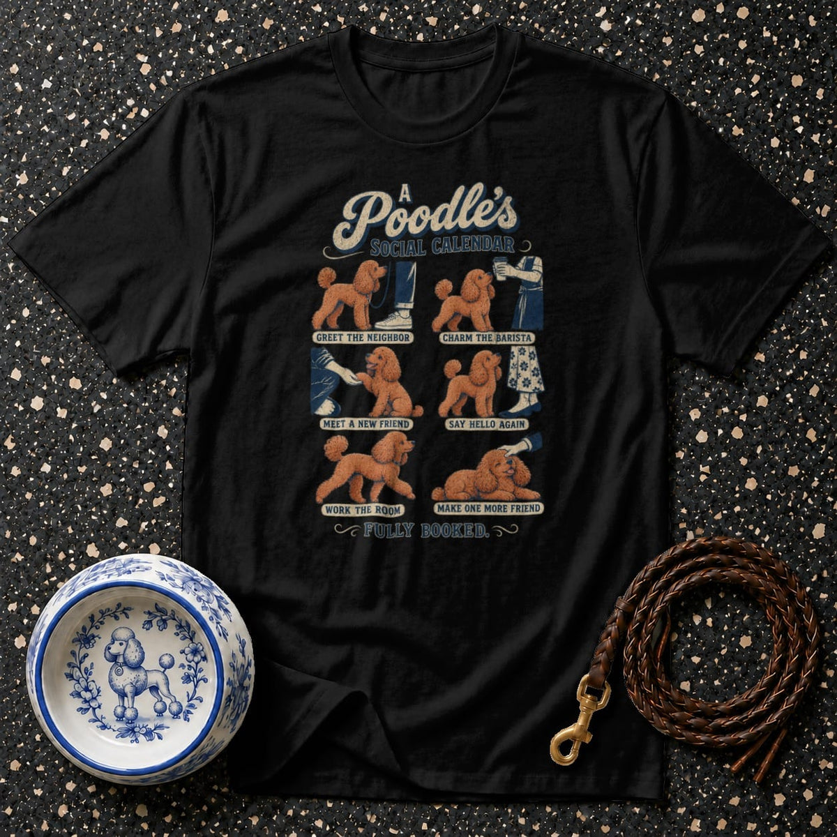 Black t-shirt with "A Poodle's Social Calendar" and six illustrated poodle activities.