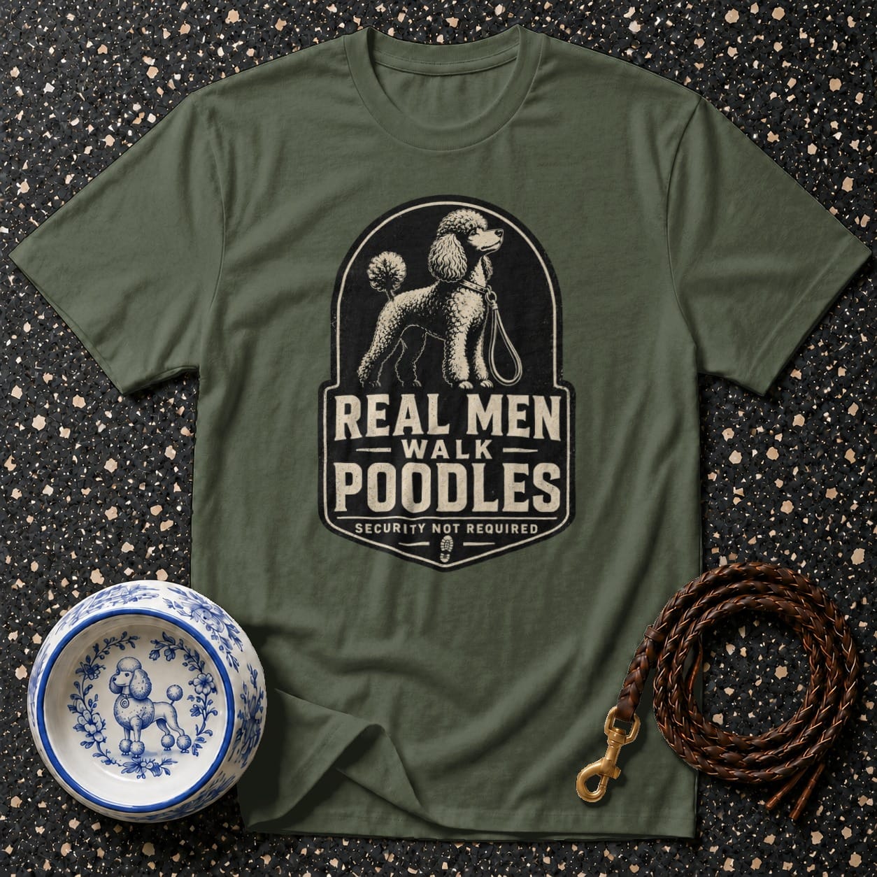 Olive t-shirt with "Real Men Walk Poodles" graphic.