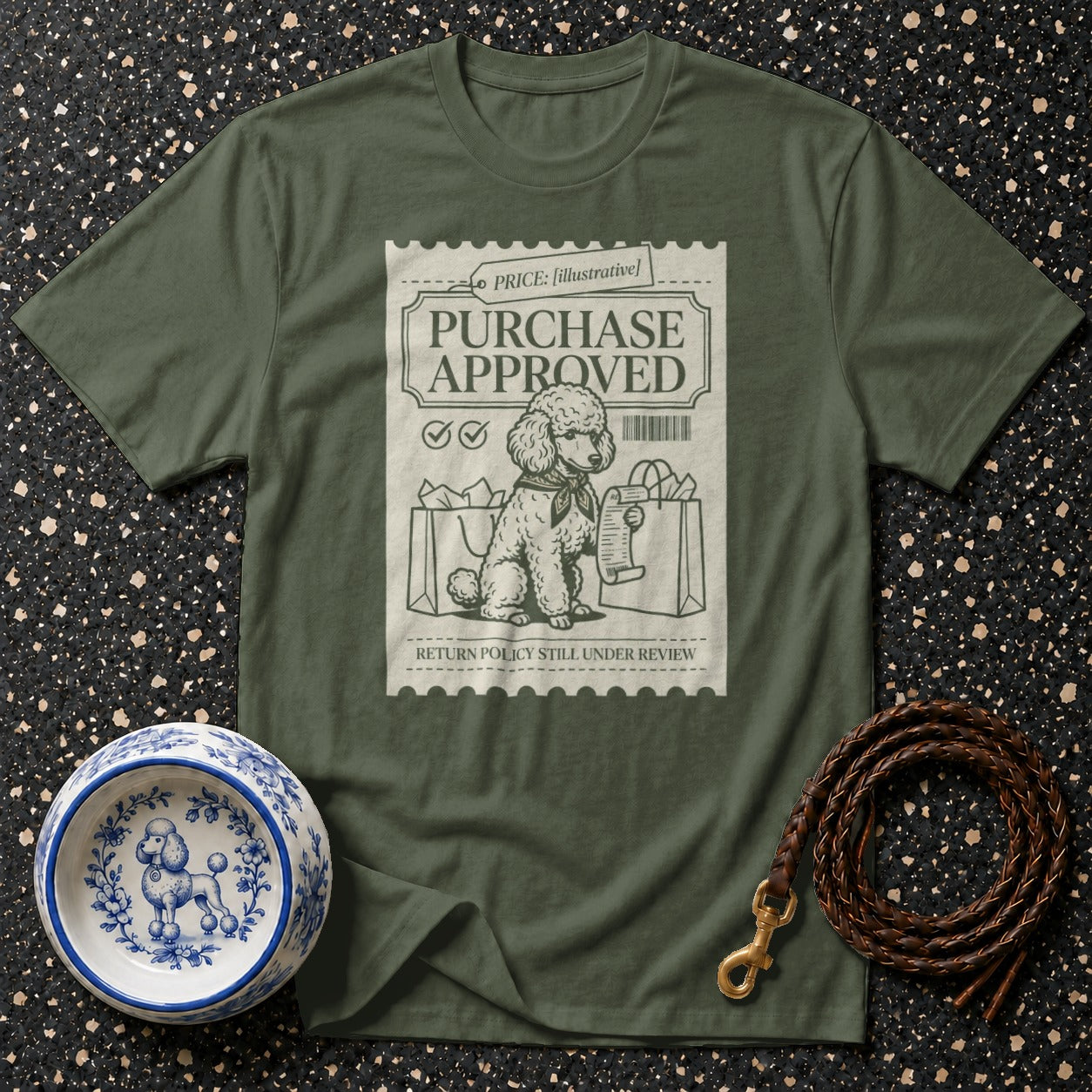 Olive green t-shirt with "PURCHASE APPROVED" stamp graphic featuring a poodle.
