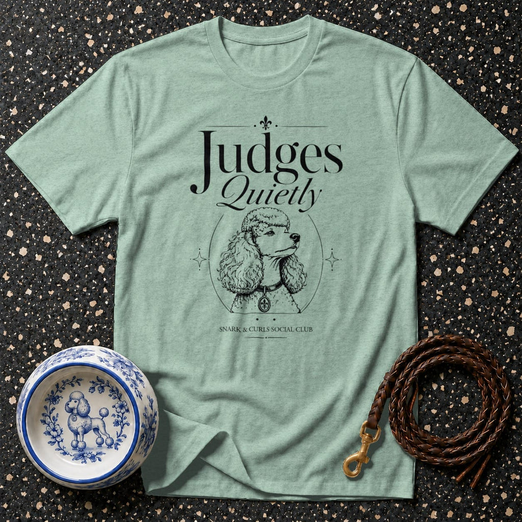 Light blue t-shirt with "Judges Quietly" text and poodle illustration.