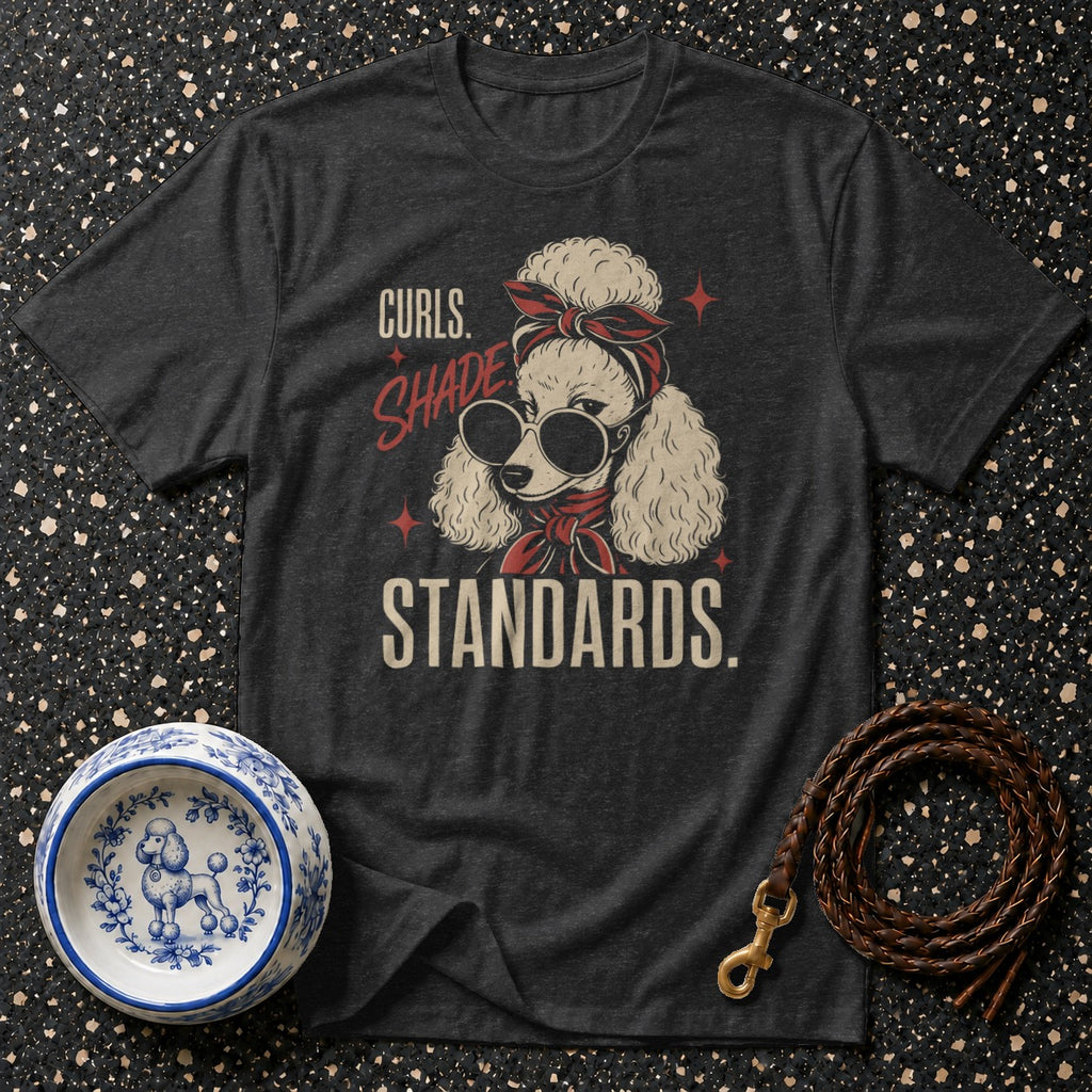 Dark t-shirt with a poodle wearing sunglasses and bandana, text "Curls. Shade Standards."