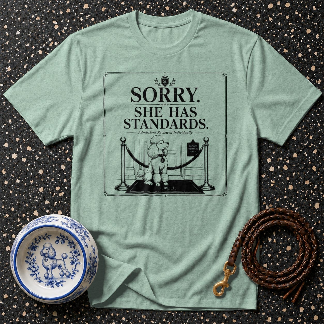 Green t-shirt with "Sorry, She Has Standards" text and a poodle design.